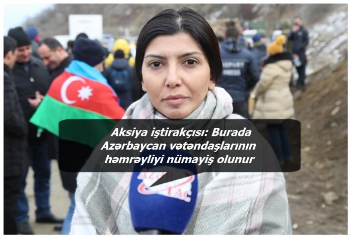 <Aksiya iştirakçısı: Burada Azərbaycan vətəndaşlarının həmrəyliyi nümayiş olunur.....